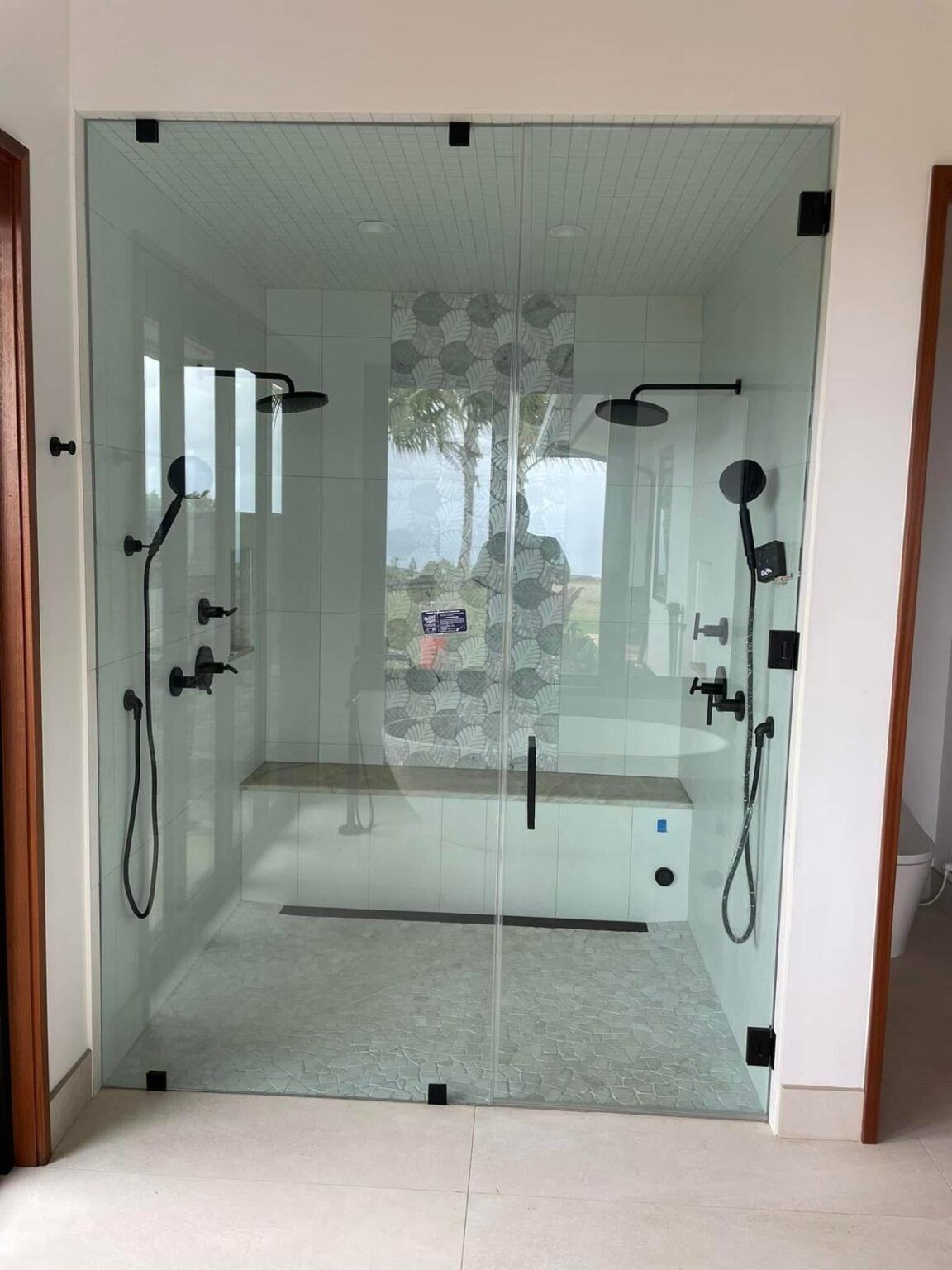 Glass shower door installed by Maryland Glass and Door